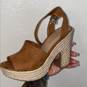 Brown wedge heels.
